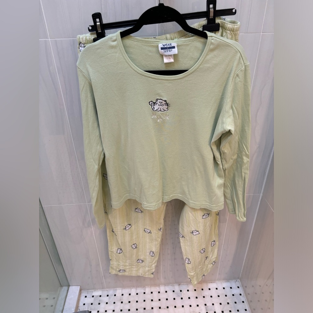 The cat pyjamas are actually the cats pyjamas.